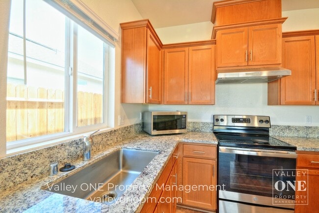 Building Photo - COMING SOON! 4 bedroom, 2 bath, pet-friendly NEWER HOME with Solar