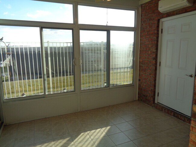 Building Photo - APPLICATION PENDING-Clemmons-Lovely Patio Home with Sunroom