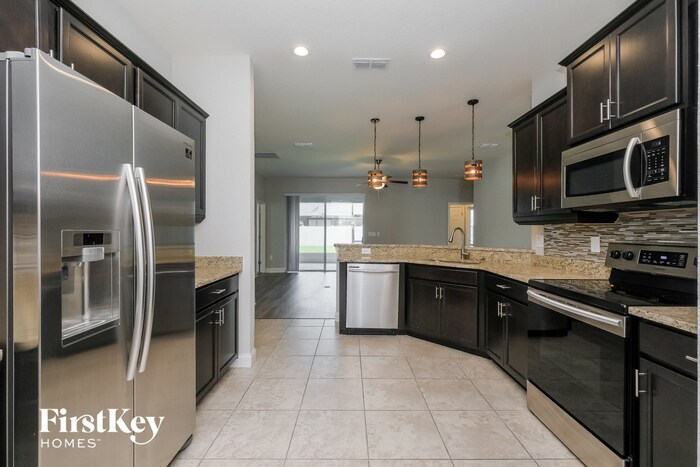 Building Photo - 5812 Valentino Way
