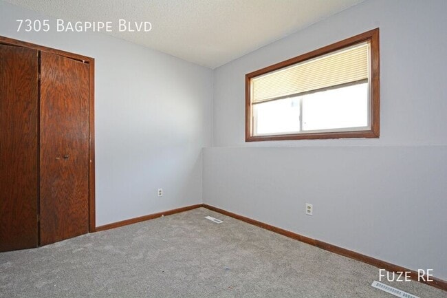 Building Photo - 7305 Bagpipe Blvd