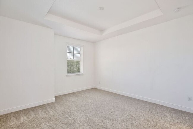 Building Photo - Elegant 2/2.5 Townhome in Guard-Gated Eagl...