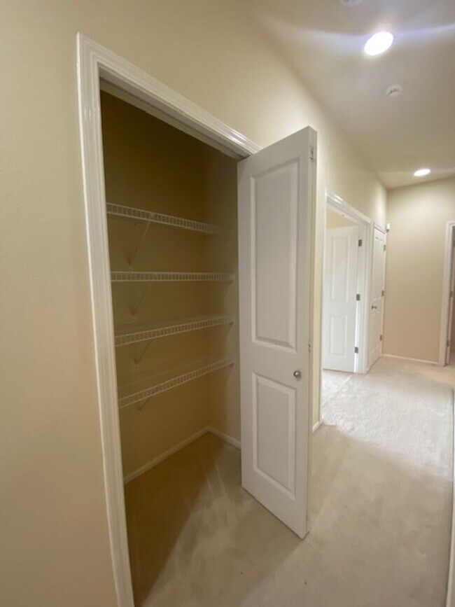 Building Photo - Beautifully Renovated 4 bedroom Home with attached 4 car garage!