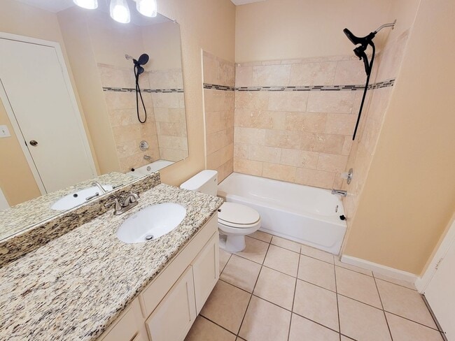 Building Photo - Welcome to This Charming Townhome Nestled ...
