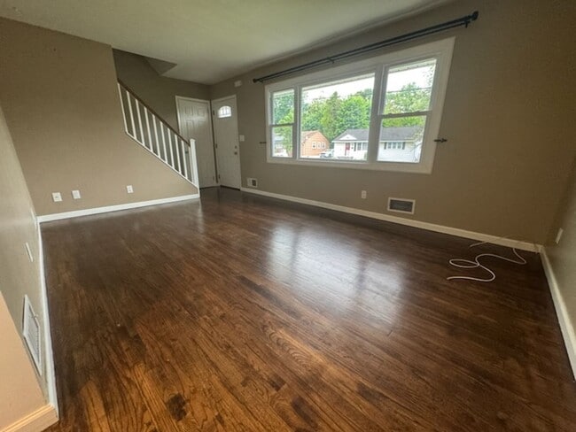 Building Photo - Sunny, Modern Mid-Century Cape 4 BR Spacio...
