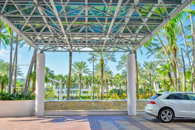 Building Photo - 18911 Collins Ave