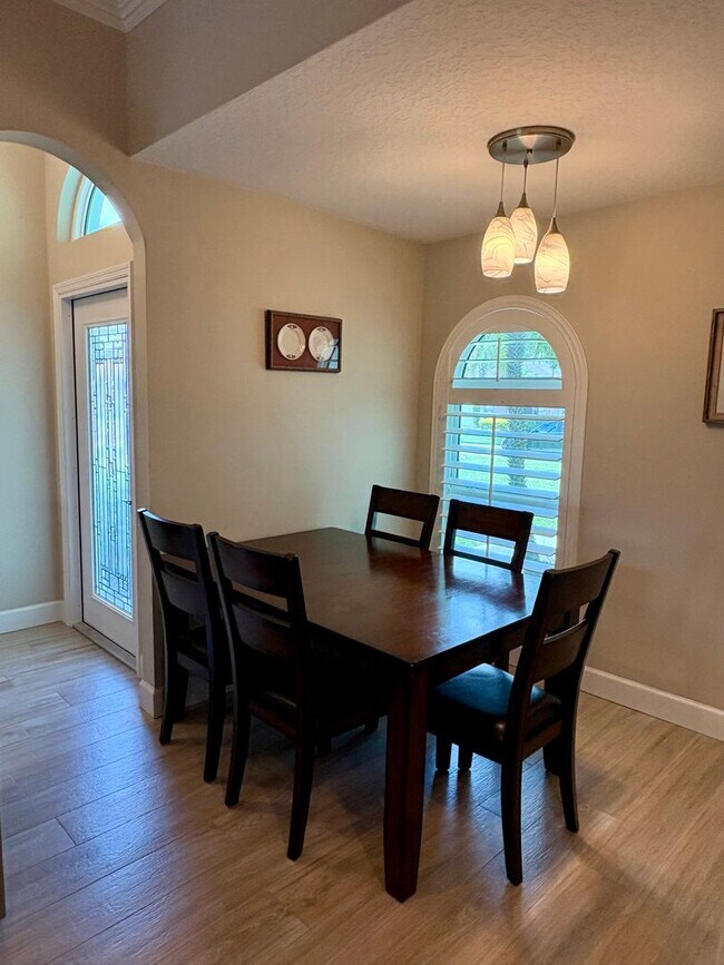 Building Photo - 3/2/2 with huge screened-in lake view patio in The Pines/Jensen Beach