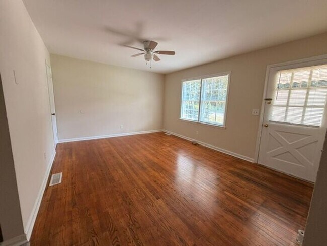 Building Photo - Three bedroom brick home available now!
