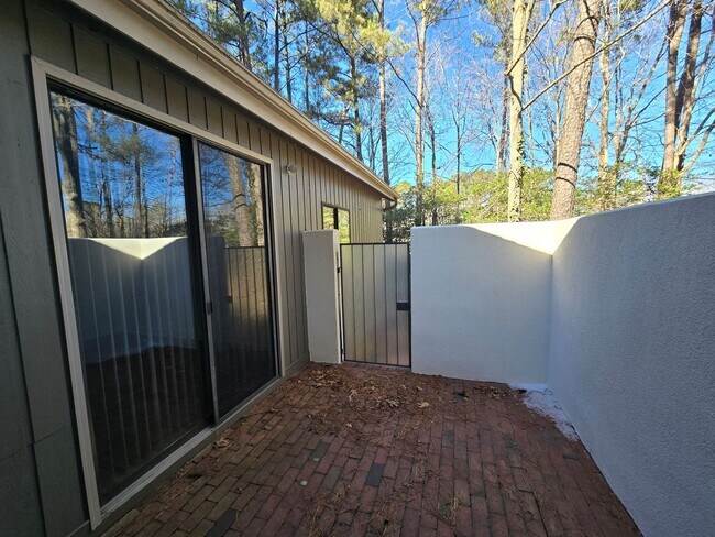 Building Photo - Multigenerational or Grad Student Living! Spacious One-Story End Unit in Prime Location on 54