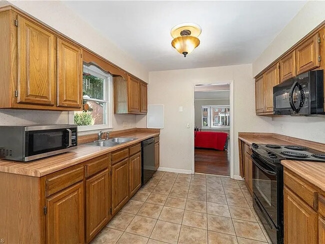 Building Photo - Earn Wealth While Leasing - Like a Homeown...