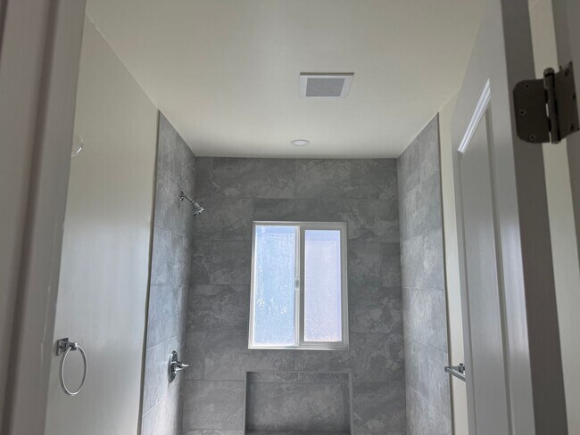 Building Photo - FOR RENT — COMPLETELY REMODELED Apartment