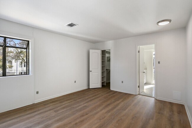 Building Photo - Newly Renovated 3BD/2BA Penthouse, 1/2 Block Off St Charles Ave. Private Roof Deck!