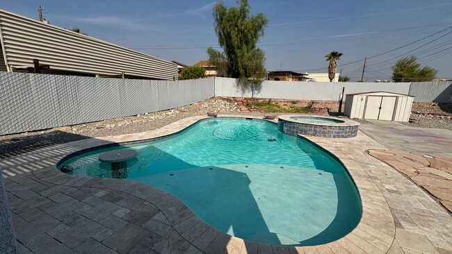 Building Photo - Unfurnished 3 Bedroom 2 Bath Pool/Spa Home!