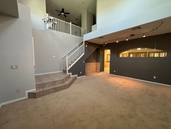 Building Photo - Gated Green Valley Ranch Townhome | 2 Bed | 2.5 Bath | 2-Car Garage