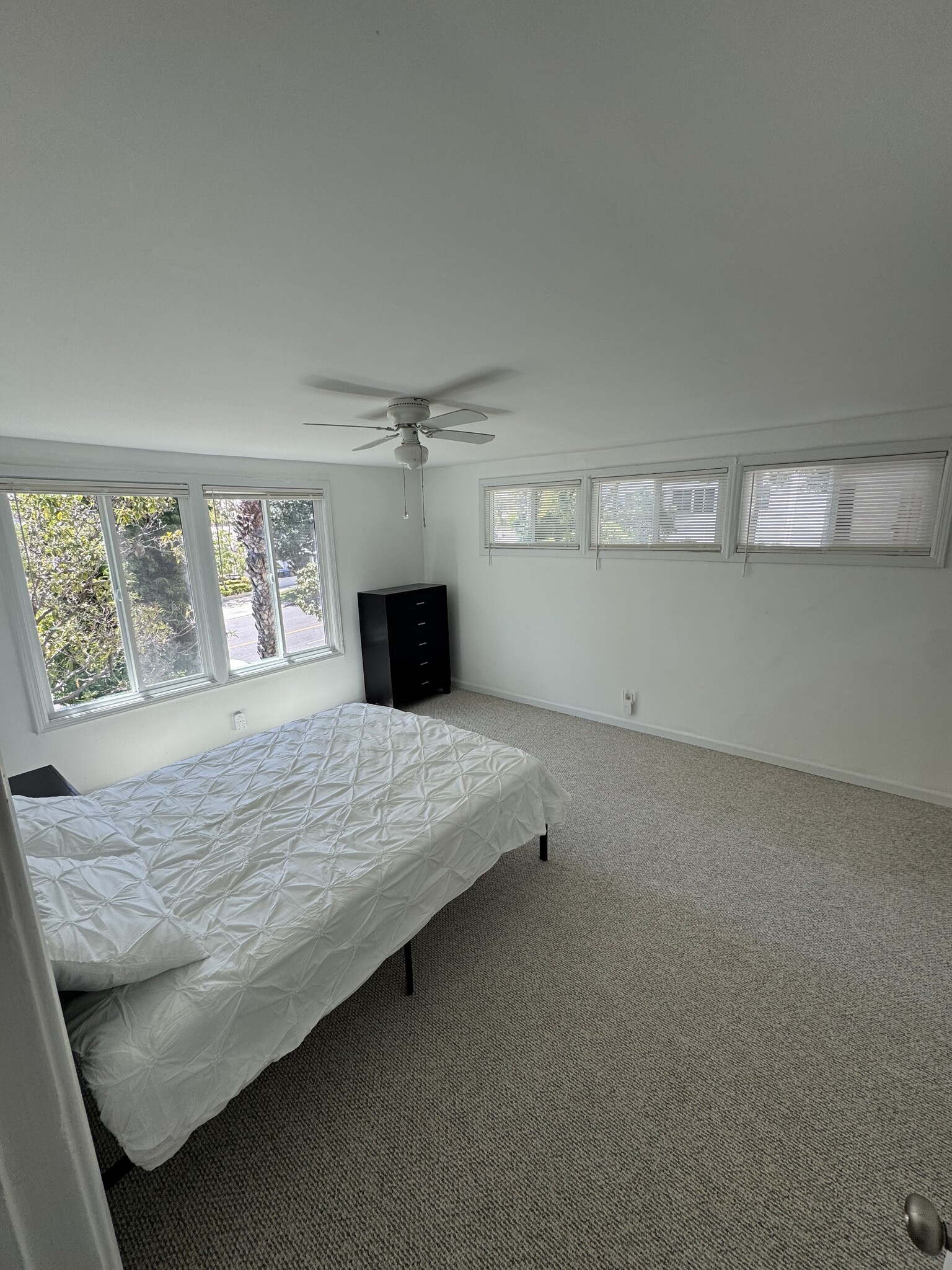 Large bright bedroom with new carpet and large closet - 1320 S Beverly Glen Blvd