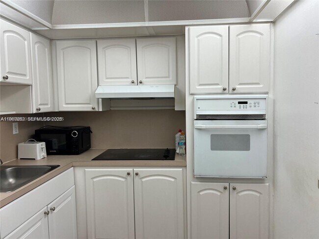 Building Photo - 19380 Collins Ave