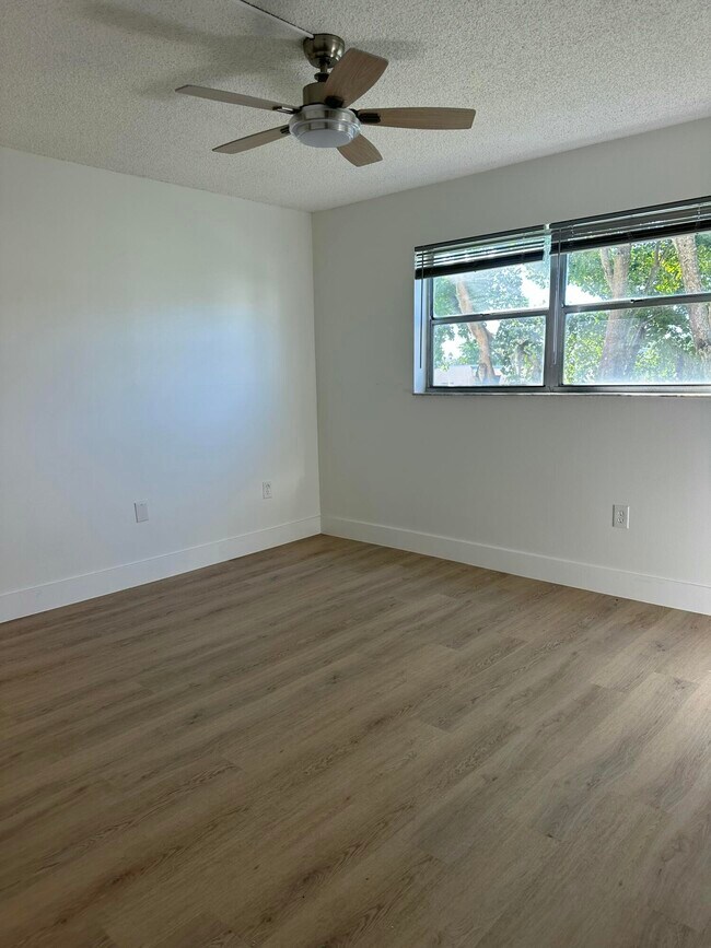 Building Photo - 8130 Sunrise Lakes Blvd