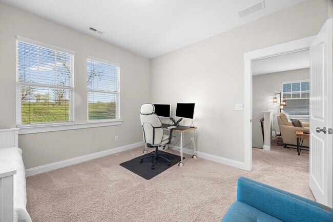 Building Photo - Fully Furnished 3BR Retreat in Riverwalk | Office + Screened Patio