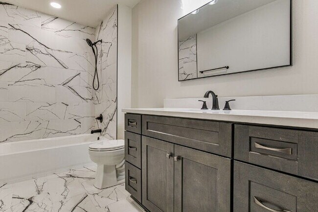 Building Photo - This luxurious new custom home in the sought-after Shadow Grove subdivision is a masterpiece of m...