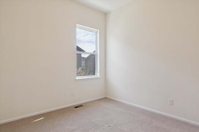 Building Photo - Modern 4-Bed Ranch in Erie with 13-Ft Ceilings, Solar Panels & EV Charger