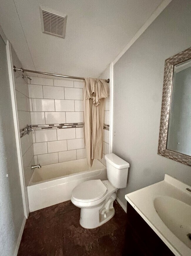 Building Photo - 10136 W University Blvd