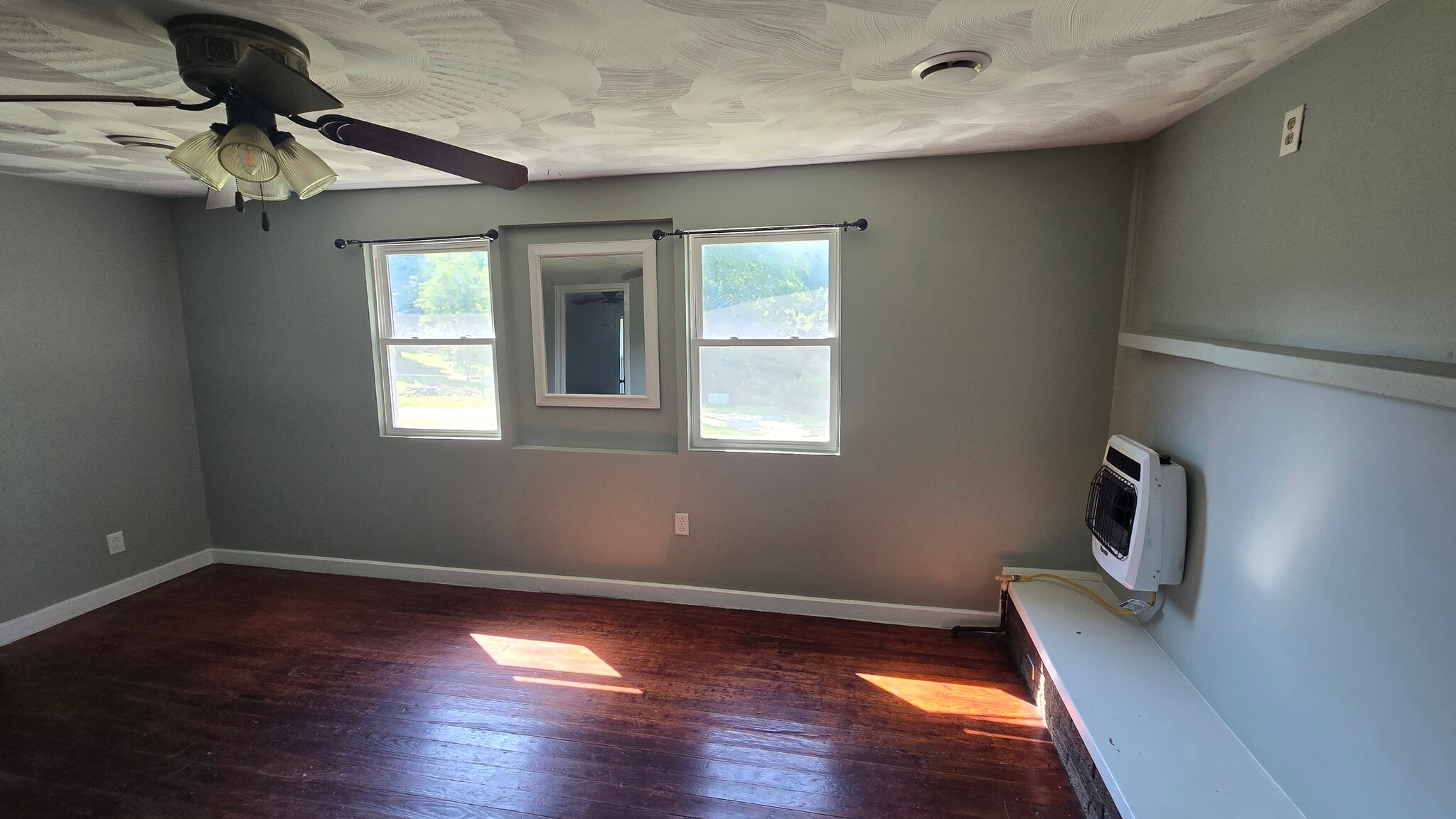 Living room. Backup gas heater - 68 Elway Dr