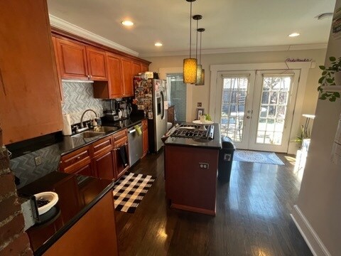 Updated kitchen with lots of storage. Stainless steel appliances. Gas range and dishwasher. - 713 S 5th St