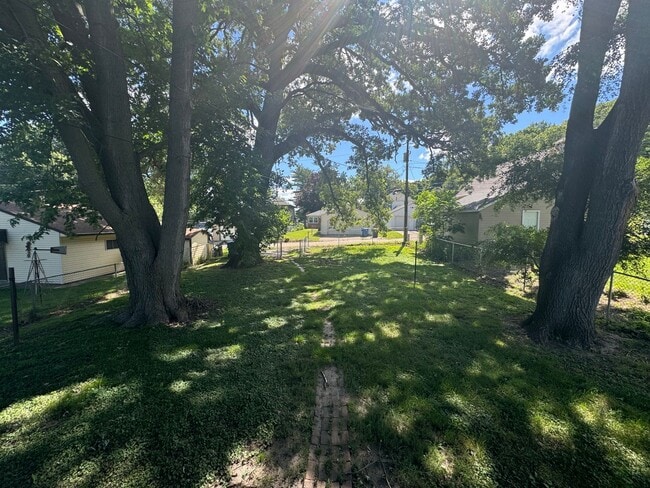 Building Photo - Updated 2 Bedroom Home in Moline | Fenced Yard | Central Air | Dishwasher