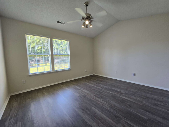 Building Photo - A home that exudes Warmth and Style
