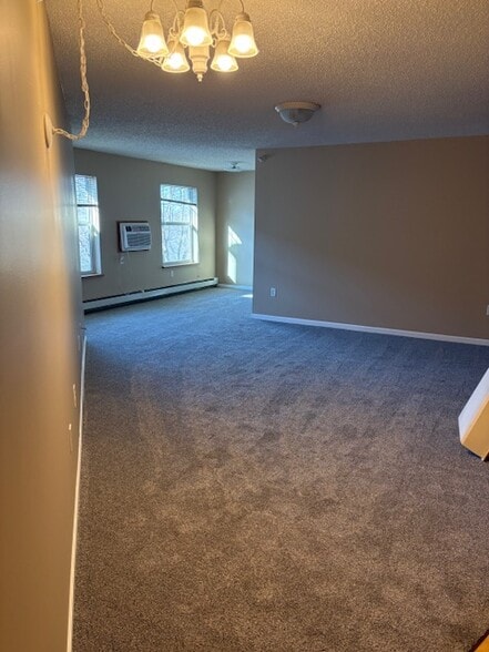 studio living room/bedroom - Windsong Apartments