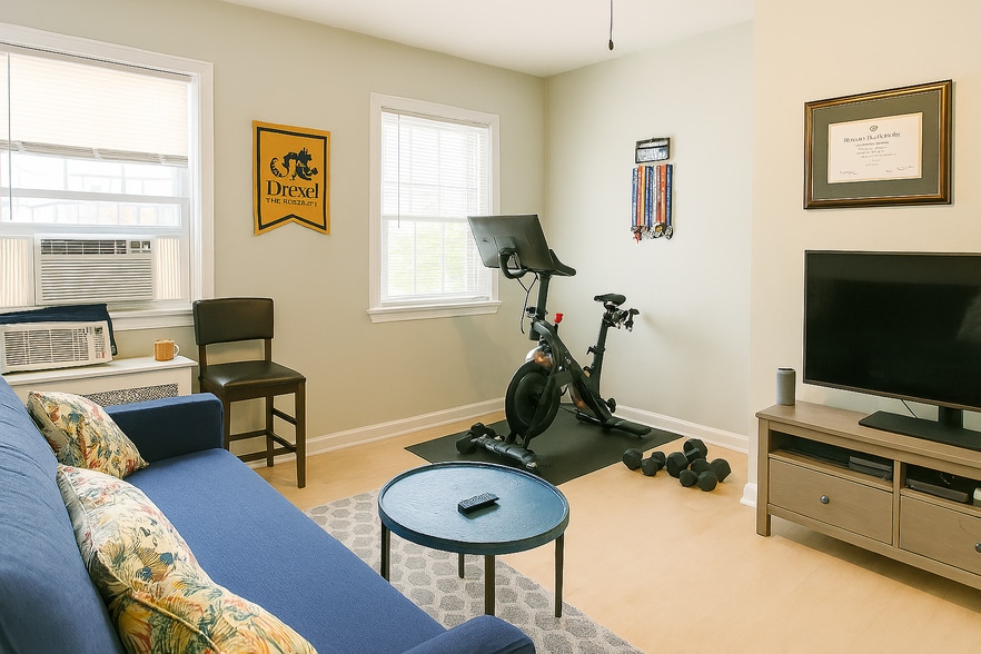 2nd bedroom with a ceiling fan, high ceilings, efficient use of space, and a full backyard view - 56 Jefferson Ave