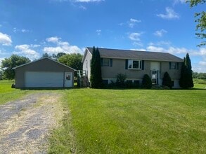 Building Photo - Beautiful secluded 4 bedroom 2.5 bath home with 2 stall detached garage and descent sized yard