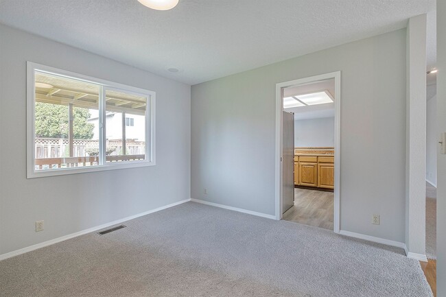 Building Photo - Spacious 5-Bedroom Home with Beautiful Bac...