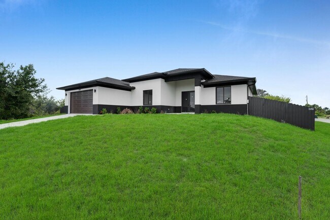 Building Photo - Brand-New Pool Home for Rent – Port Charlo...