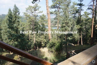Building Photo - "Charming Evergreen Retreat: Spacious 3-Be...