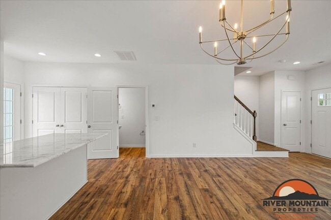 Building Photo - Well-Located Townhome with Private Off-Street Parking