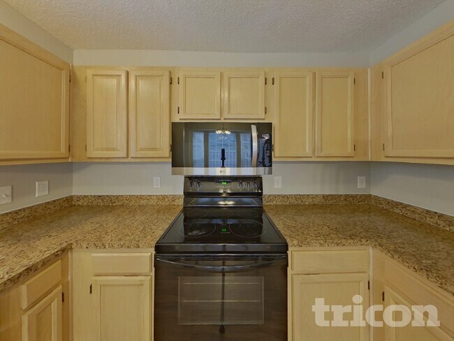 Building Photo - 8523 Lockerbie Ln