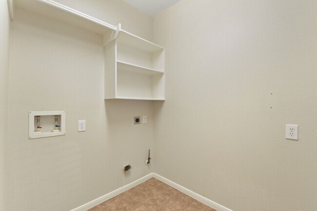 Building Photo - Remodeled & Ready: Bright, Functional Home...