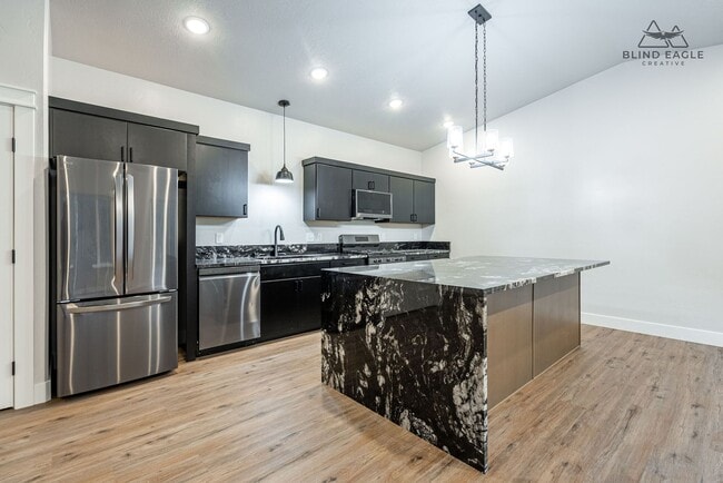 Building Photo - 7472 N Paw St