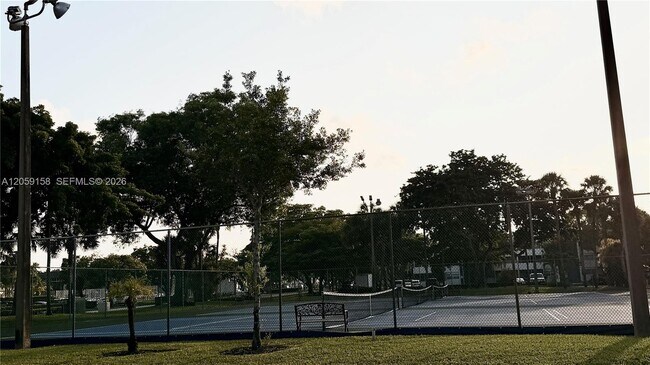 Building Photo - 6090 N Sabal Palm Blvd