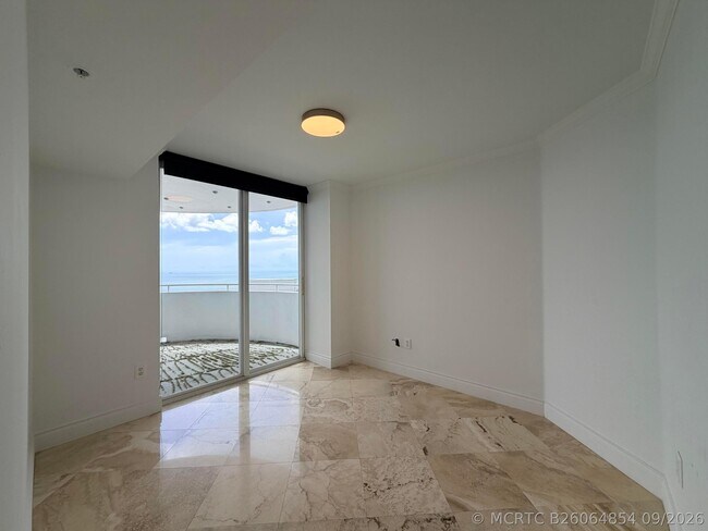 Building Photo - 6301 Collins Ave