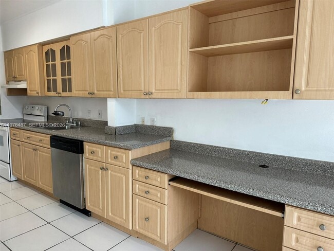 Building Photo - 10210 Collins Ave