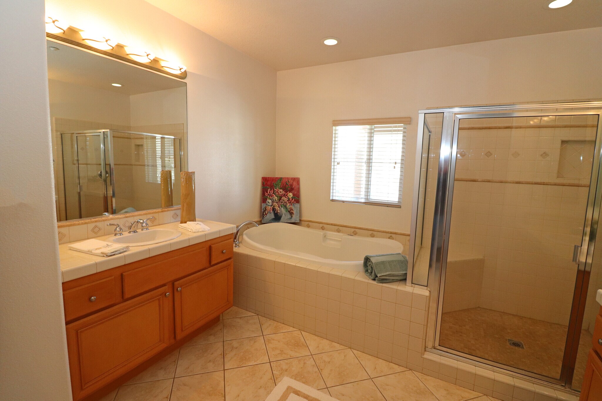 Primary bathroom (shower, spa tub and separate vanities on each side) - 4415 Ahoy Ln