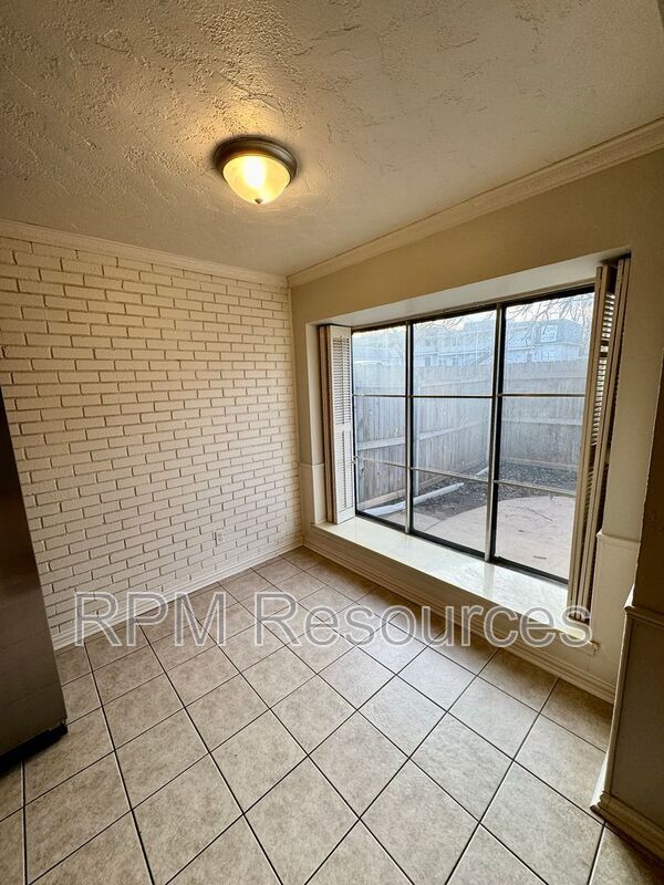 Building Photo - 11407 N May Ave