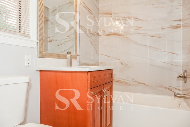 Building Photo - Lease today! No extra charge for contentment and relaxation!