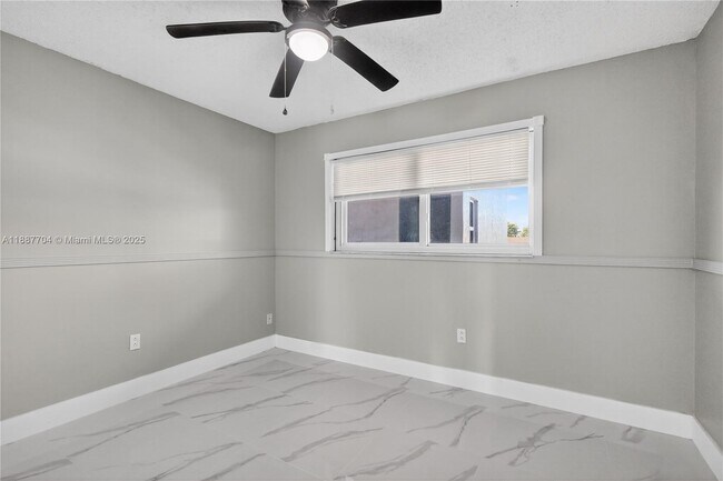 Building Photo - 9915 W Okeechobee Rd