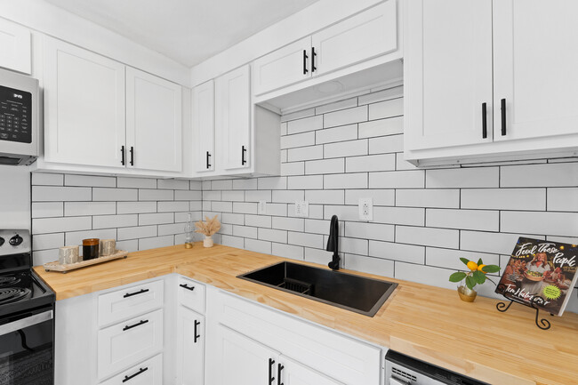 Tile backsplash and butcher block counters - 25 W Ofallon Dr