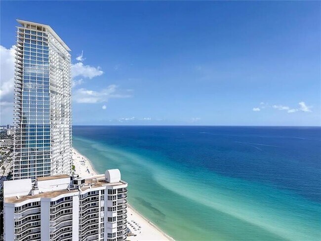 Building Photo - 16699 Collins Ave