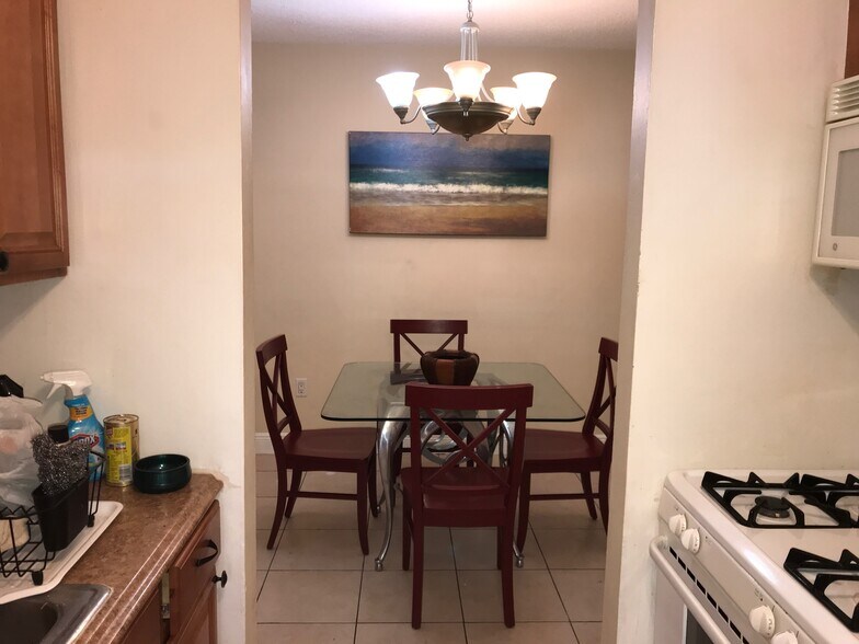 view of dining room from kitchen - 265 SW 7th St