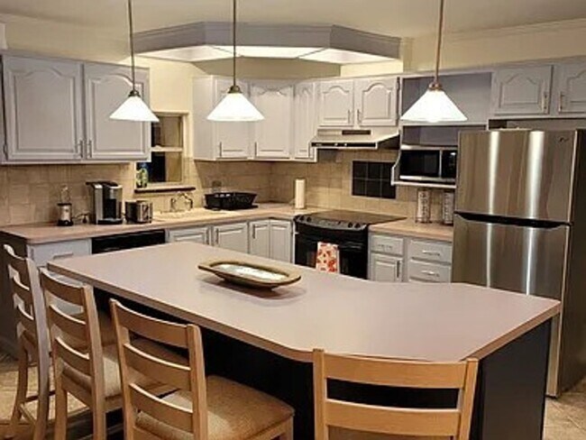 Building Photo - Breathtaking Lake View Retreat with Modern Updates!