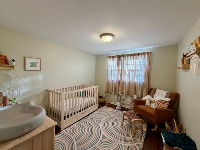 Building Photo - {7710} Prairie Village Split Level with Two Car Garage + Two Full Bathrooms + Hardwood Floors + U...